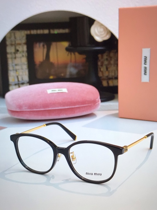 Miu Miu Accessories - Miu Miu Black and Gold Round Women's Eyeglasses